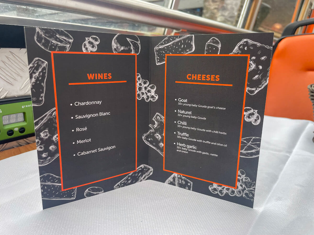 Lovers Canal Cruise cheese and wine menu