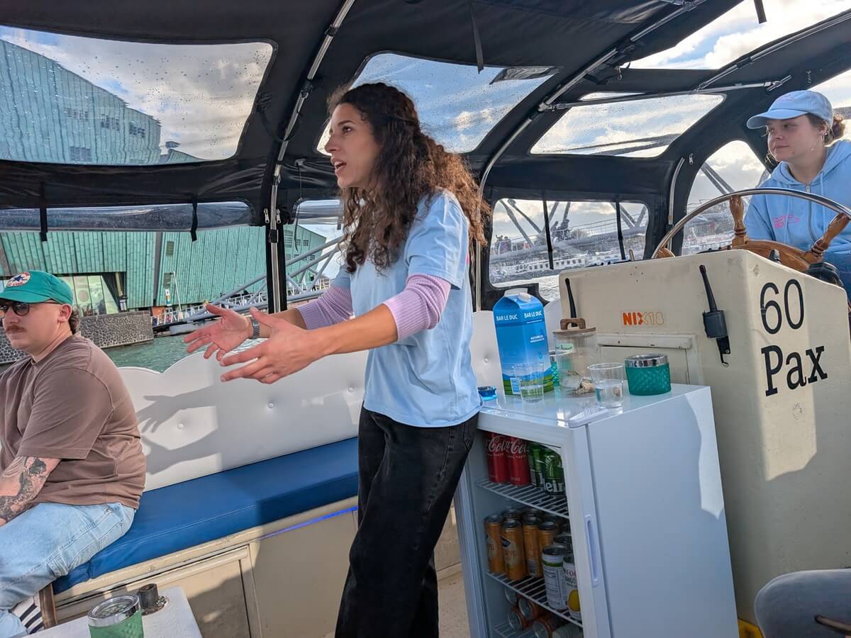 Hostess giving live commentary during the cruise
