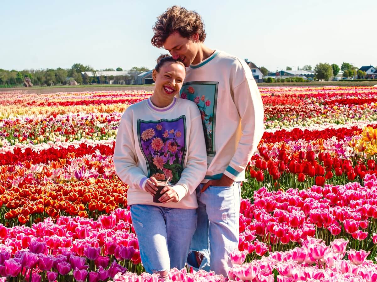 Couple posing in flower fields - Tulip Experience Amsterdam